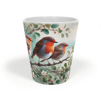 Thumbnail for Ceramic mug featuring an illustration of three red robin birds perched on a branch surrounded by foliage, designed for bird lovers and nature enthusiasts, with a detailed, nature-inspired artwork.