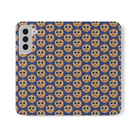 Thumbnail for Close-up of the ChocoChip Delight Flip Phone Case featuring a cute repeating pattern of cartoon-style cookies with large eyes on a blue background, crafted from premium faux vegan leather, with interior card slots and an elastic closure.