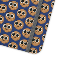 Thumbnail for Close-up of the ChocoChip Delight Flip Phone Case featuring a cute repeating pattern of cartoon-style cookies with large eyes on a blue background, crafted from premium faux vegan leather, with interior card slots and an elastic closure.