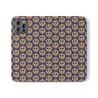 Thumbnail for Close-up of the ChocoChip Delight Flip Phone Case featuring a cute repeating pattern of cartoon-style cookies with large eyes on a blue background, crafted from premium faux vegan leather, with interior card slots and an elastic closure.