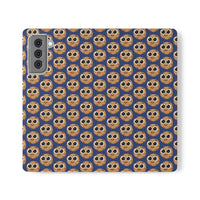 Thumbnail for Close-up of the ChocoChip Delight Flip Phone Case featuring a cute repeating pattern of cartoon-style cookies with large eyes on a blue background, crafted from premium faux vegan leather, with interior card slots and an elastic closure.