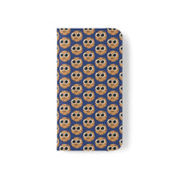 Thumbnail for Close-up of the ChocoChip Delight Flip Phone Case featuring a cute repeating pattern of cartoon-style cookies with large eyes on a blue background, crafted from premium faux vegan leather, with interior card slots and an elastic closure.